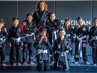 Young students in training gis at CH Martial Arts Academy, The Sustainable City, Dubai